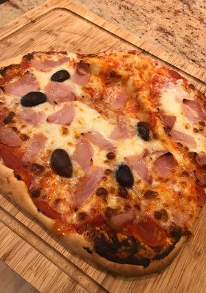 A picture of Pizza recipe including how to make the base.