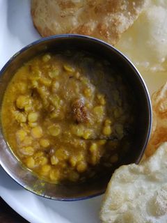 লুচি ছোলার ডাল(luchi cholar dal recipe in Bengali) রেসিপির প্রধান ছবি