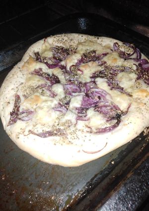 Una foto de Fugazza o pizza genovesa