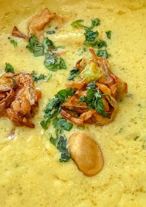 A picture of Kadhi Pakoda / kadhi Pakora / Onion Pakoda.