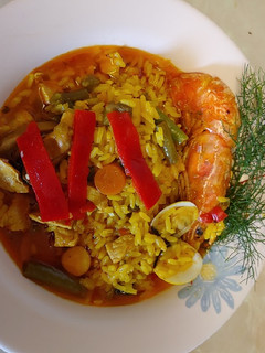 Una foto de Arroz meloso mar y tierra