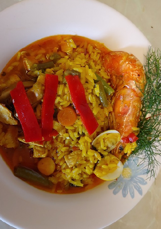 Una foto de Arroz meloso mar y tierra