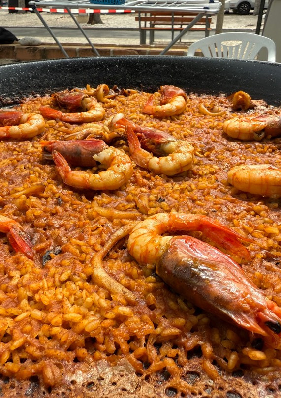 Una foto de Arroz de gamba roja y calamar