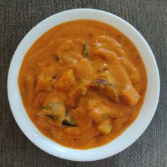 A picture of Pumpkin Curry In Coconut Gravy.