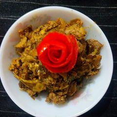 A picture of Chhatu Patra Poda/ Baked Mushroom in a traditional way.