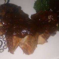 A picture of Grilled pork with gravy.