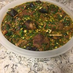 A picture of Okro soup with goat meat.