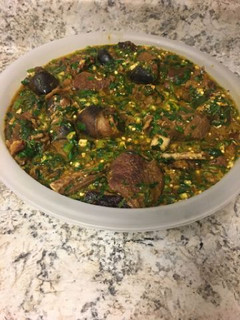 A picture of Okro soup with goat meat.