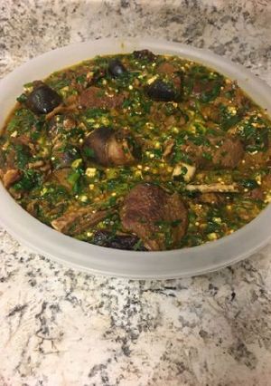 A picture of Okro soup with goat meat.