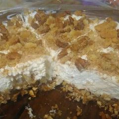 A picture of Hazelnut Cheesecake with Pretzel Coconut Pecan Crust.
