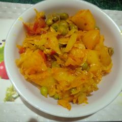 A picture of Cabbage and peas veg.