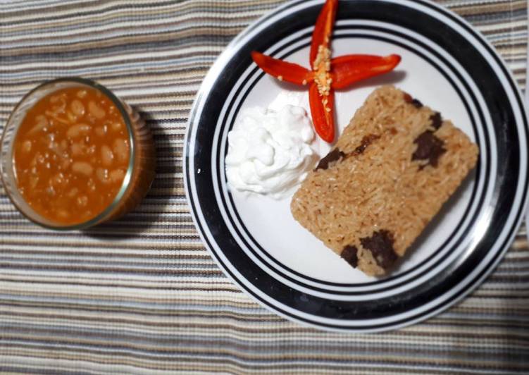 Recipe: Tasty Pilau served with beans