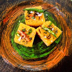 A picture of Veggie stuffed Moong dal and Oats Dhokla.
