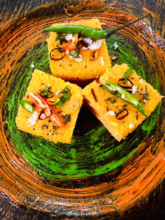 A picture of Veggie stuffed Moong dal and Oats Dhokla.