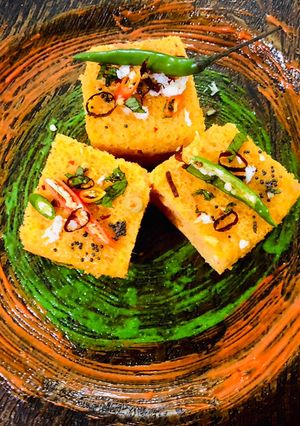 A picture of Veggie stuffed Moong dal and Oats Dhokla.