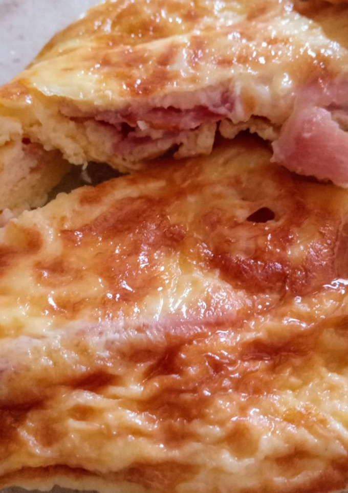 Una foto de Tortilla individual de bacon y queso
