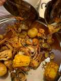 Seafood boil w/red n hot sauce