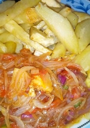 A picture of Fried sweet potatoes with onion sauce.