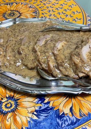 Une photo de Longe de porc au miel, moutarde, thym et échalotes