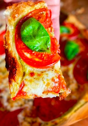 A picture of Quick Caprese Puff Pastry Pizza with Basil Pesto by TastyPinch.