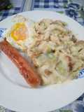 Repollo con puré de patata y salchichas