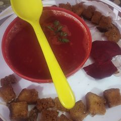 A picture of Red veggies soup.