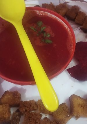 A picture of Red veggies soup.
