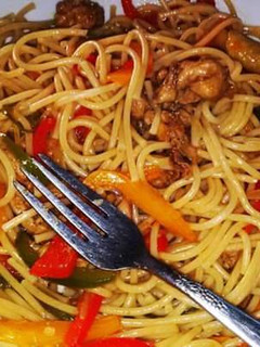 A picture of Pasta Mixed with sausage.