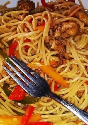 A picture of Pasta Mixed with sausage.
