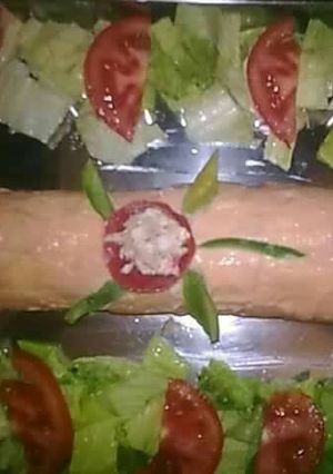 Foto principal de Brazo salado relleno de queso lechuga atún y palitos de cangrejo