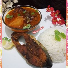 Fish ka salan with boil rice and fry fish A picture of Fish ka salan with boil rice and fry fish.