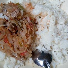 A picture of Meat,Cabbage stew with Rice.