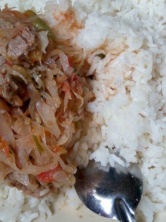 A picture of Meat,Cabbage stew with Rice.