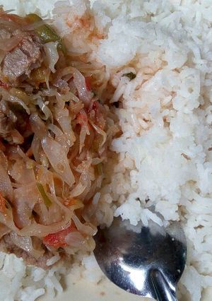 A picture of Meat,Cabbage stew with Rice.