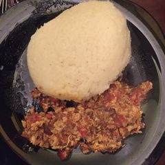 A picture of Ugali with scrambled eggs.