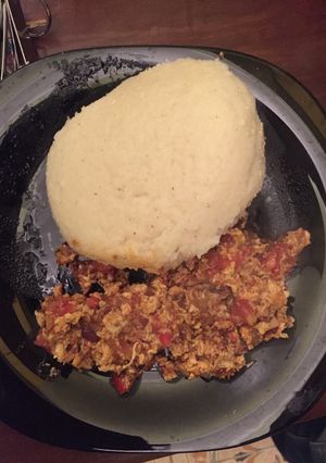 A picture of Ugali with scrambled eggs.