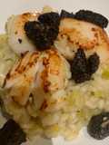 Simple risotto base topped with scallops and black pudding