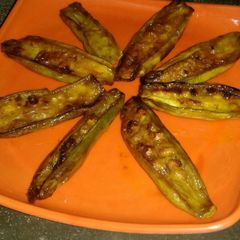 Potol bhaja(fried pointed gourd) A picture of Potol bhaja(fried pointed gourd).
