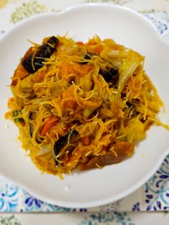 A picture of Stir-Fried Rice Noodles with Pumpkin.