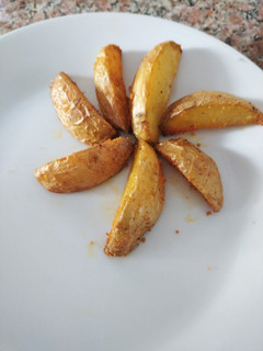 Una foto de Papas rústicas