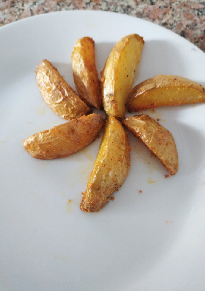 Una foto de Papas rústicas