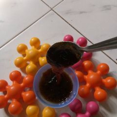 A picture of Tamarind Gojju/Curry.
