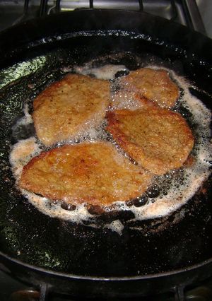 Una foto de Milanesas de cerdo al disco de arado