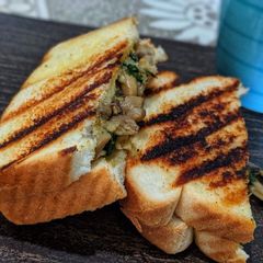 A picture of Mushroom spinach sandwich.