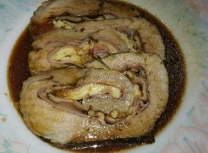 Una foto de Lomo de cerdo rustido, relleno de york, bacon y queso