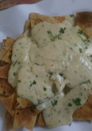 रोटी नाचोस  चिञि डीप (Roti Nachos and Cheese Dip recipe in hindi) रेसिपी मुख्य फोटो