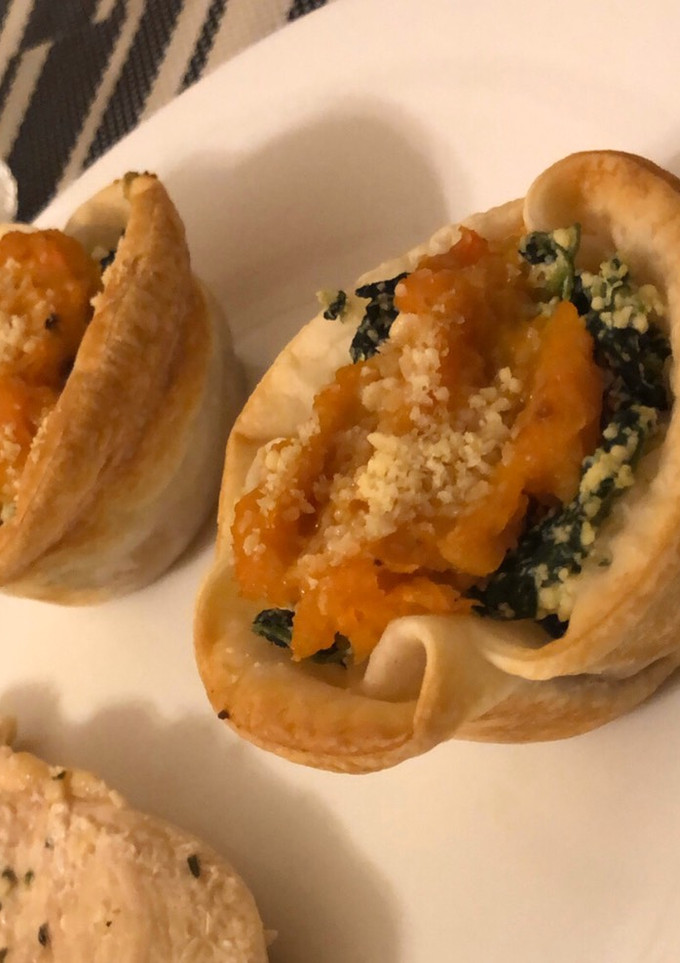 Una foto de Canastitas de calabaza, espinaca y ricota