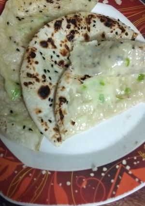 A picture of Chilli Cheese Stuffed Kulcha On Tava.