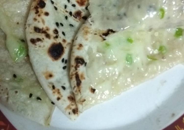 Step-by-Step Guide to Prepare Super Quick Chilli Cheese Stuffed Kulcha On Tava
