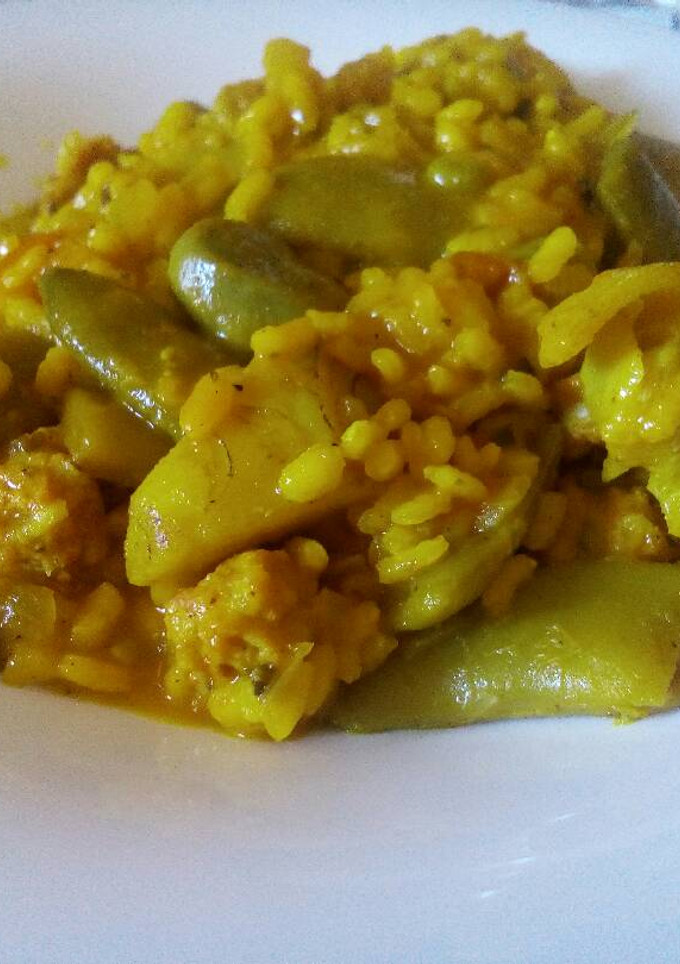 Una foto de Arroz caldoso con judías, habas y alcachofas